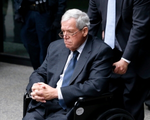 FApril 27, 2016, in Chicago, after his sentencing on federal banking charges which he pled guilty to last year. Hastert was sentenced to more than a year in prison in the hush-money case that included accusations he sexually abused teenagers while coaching high school wrestling. (AP Photo/Charles Rex Arbogast) ORG XMIT: ILCA112